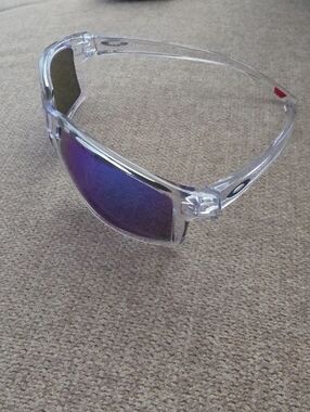 Oakley Clear Frame Sunglasses with Blue Prism Lenses